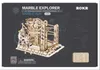 A 3D wooden model of a marble run toy, presented on a dark background with illustrative diagrams and text. Voir les images du produit