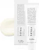 A product shot of a tube of cream and a separate dollop of cream. Podgląd zdjęcia produktu