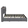 A side view of a gray upholstered bed frame with a wooden headboard accent, shown without a mattress. Anteprima dell’immagine prodotto