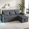 A gray L-shaped sectional sofa with a chaise lounge is shown in a living room setting, featuring built-in LED lights and USB ports. Produktbild-Vorschau