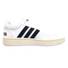 A white Adidas sneaker with navy blue stripes and a cream sole, isolated on a white background. Anteprima dell’immagine prodotto