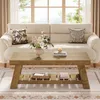 A living room scene with a couch, coffee table, and rug. Anteprima dell’immagine prodotto