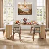 A dining table set for a meal in a well-lit room with large windows. Anteprima dell’immagine prodotto