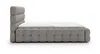 A side view of a beige upholstered bed with a tufted headboard and frame, on a white background. Náhled obrázku produktu