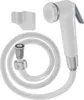 A white bidet hand shower with a white hose and a wall mount. Anteprima dell’immagine prodotto