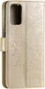 A gold flip case for a smartphone with a mandala pattern embossed on the cover. Produktbild-Vorschau