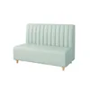 A light green sofa is shown against a white background. Voir les images du produit