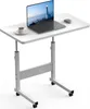 A white adjustable height laptop table with a laptop, coffee cup, and mouse on it, set against a white background. Produktbild-Vorschau
