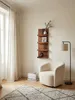 Modernes Hängeregal aus Sheesham Massivholz (30x80cm) an einer Wohnzimmerwand, bestückt mit stilvoller Dekoration für eine warme und persönliche Atmosphäre._#sku_BARWL6.532# Produktbild-Vorschau