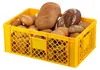 A yellow plastic crate filled with various types of bread. Produktbild-Vorschau