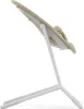 A side view of a baby high chair on a white background. Voir les images du produit