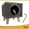 A cat house with a dangling toy and an Allen wrench on a white background. Produktbild-Vorschau