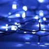A close-up, abstract view of blue LED string lights. Produktbild-Vorschau