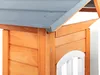 Close-up view of the corner of a wooden playhouse, showing the roof and wall construction. Náhled obrázku produktu