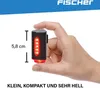 A hand holding a small black and red LED light, with a size measurement indicated. Anteprima dell’immagine prodotto