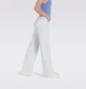 A person wearing white wide-leg jeans and a blue tank top, shown from the side. Produktbild-Vorschau