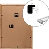 The back of a wooden picture frame with measurement details and a close-up of the frame's corner. Produktbild-Vorschau