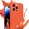 A close-up shot of an orange iPhone case with splashes of orange liquid around it. Produktbild-Vorschau