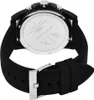 The back of a black Armani Exchange watch with a silicone strap and a silver buckle. Podgląd zdjęcia produktu
