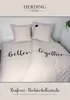 A bed with "Better together" bedding and two pillows. Produktbild-Vorschau