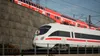Two trains on parallel tracks, one in the foreground and one in the background. Produktbild-Vorschau