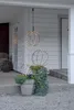 Decorative spheres with lights on a porch. Produktbild-Vorschau