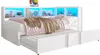 A white daybed with a pull-out trundle bed, featuring integrated shelving and LED lighting. Náhled obrázku produktu