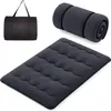 A dark gray futon mattress, a rolled-up futon mattress with straps, and a dark gray carrying bag are displayed against a white background. Náhled obrázku produktu
