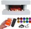 A white electric fireplace with a simulated flame effect, shown with accessories like a remote control, smartphone, decorative stones, and branches. Several colored circles representing light settings are also displayed. Náhled obrázku produktu