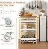 A white multi-tiered rolling cart filled with kitchen items, shown in a kitchen setting. Podgląd zdjęcia produktu