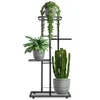 A black metal plant stand with four tiers, holding three potted plants: a trailing plant at the top, a leafy plant in the middle, and a cactus at the bottom. Náhled obrázku produktu