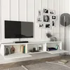 A white wall-mounted media console with a television and decorative items. Produktbild-Vorschau