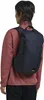 A person wearing a backpack. Produktbild-Vorschau