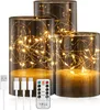 Three LED candles with integrated fairy lights and a remote control are displayed on a white background. Produktbild-Vorschau