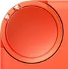 A close-up of an orange circular object with a reflective surface and a raised rim. Náhled obrázku produktu