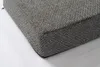 Close-up view of the corner of a dark gray cushion. Produktbild-Vorschau