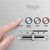 A close-up of a person's finger pressing a button on a Sage toaster. Produktbild-Vorschau