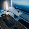 A gaming desk setup with a monitor, keyboard, mousepad, and desk lamp. Náhled obrázku produktu