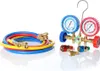 A set of air conditioning manifold gauges and hoses on a white background. Náhled obrázku produktu