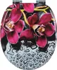 A toilet seat lid with a close-up image of dark pink orchids and water droplets. Anteprima dell’immagine prodotto