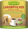 A can of Rapunzel Carob Powder with images of a bundt cake, a cup of hot chocolate, and a small bowl of chocolate pudding. Anteprima dell’immagine prodotto