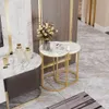A living room setting with marble-look furniture and decor. Náhled obrázku produktu