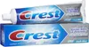 A tube and box of Crest toothpaste. Produktbild-Vorschau