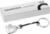 A Pandora clasp opener with a heart-shaped charm and a keychain ring, presented with its original packaging box. Náhled obrázku produktu