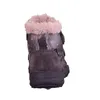 A single purple boot with pink polka dots and pink fur trim is shown from the back against a white background. Produktbild-Vorschau