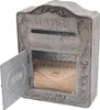 A rustic, vintage-style metal mailbox with the door open, showing an envelope inside. Podgląd zdjęcia produktu