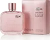 A bottle of Lacoste L.12.12 Silver Rose Eau De Parfum and its packaging are displayed against a white background. Podgląd zdjęcia produktu