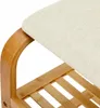 A close-up view of a bamboo shoe rack with a beige seat cushion. Produktbild-Vorschau