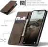 A brown leather flip case for a smartphone, showing its card and cash slots, and the phone screen displaying a landscape image. Produktbild-Vorschau