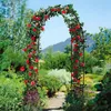 A garden scene with a rose archway. Podgląd zdjęcia produktu